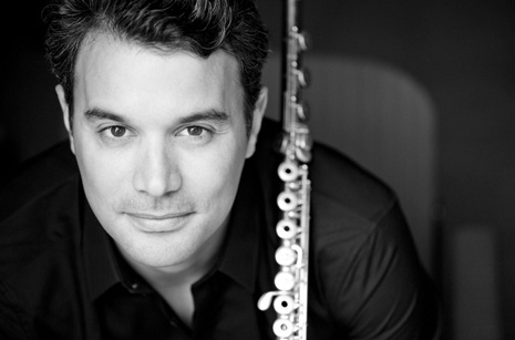 Black and white photo of Julien Beaudiment holding sankyo flute